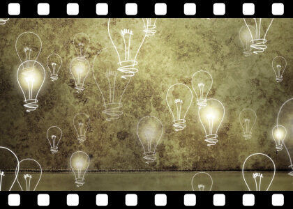 Light_Bulbs_Rising_On_Grunge_Loop stock video animated clip