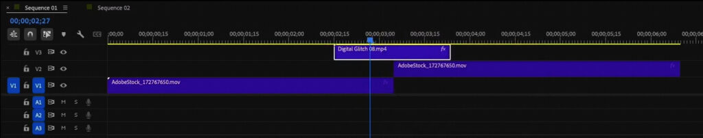 Glitch overlay clip placed above the edit point in the Premiere Pro timeline